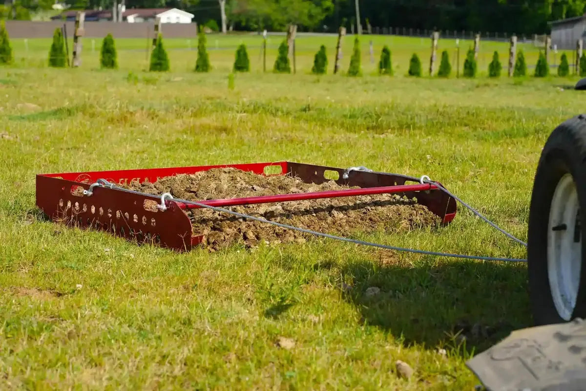 red paddock blade manure collector