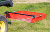 Paddock Blade being towed by ATV through a grassy paddock